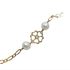 Foto de 45-233 - PULSERA 6 PERLAS 5MM - 3 FLORES 9MM 17CM 18K