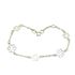 Foto de 10-00-7737 - PULSERA FLORES BICOLOR 9-7MM 18.5CM (1,46gr) 18K